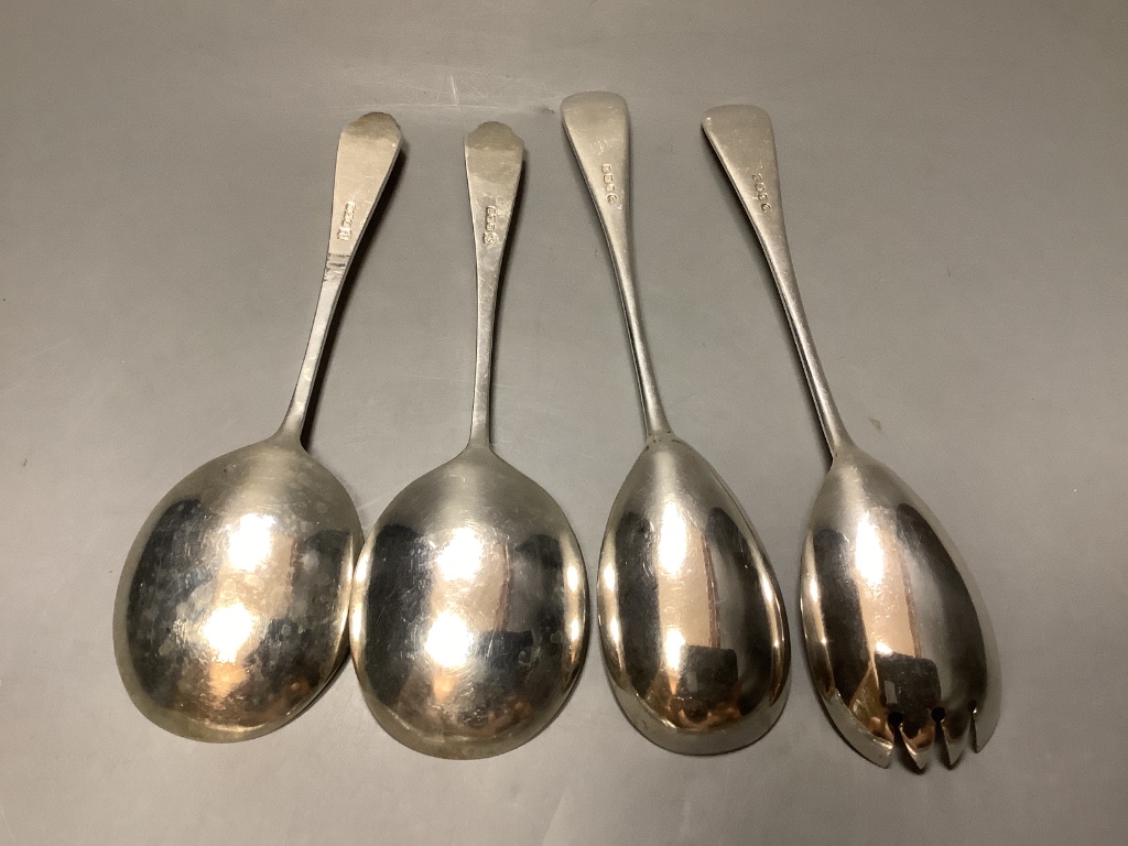 A pair of George V silver serving spoons, Sheffield, 1916, a pair of similar salad servers, a 800 fork, five other silver pieces of cutlery and seven plated items